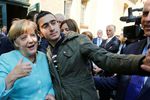Anas Modamani Angela Merkel